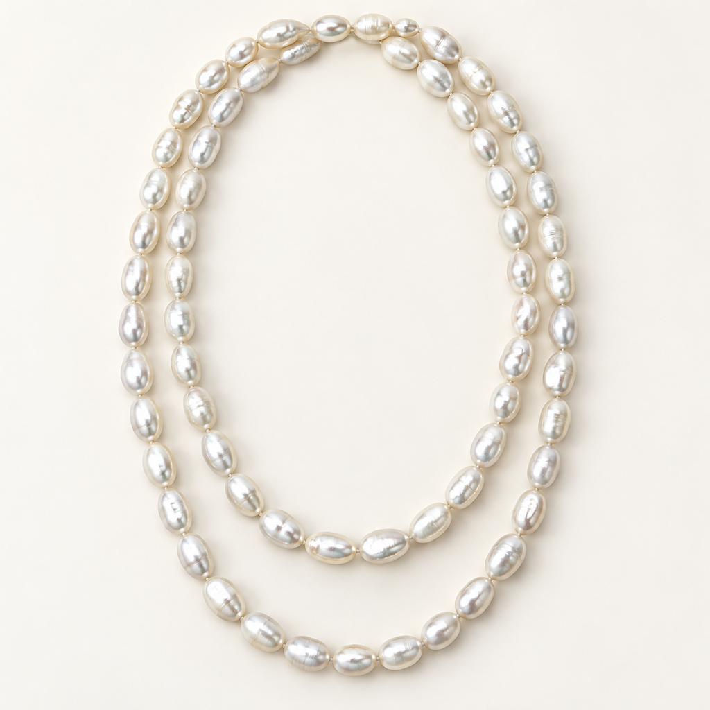 50-inch white baroque pearl necklace styled in two loops