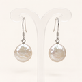 Studio visualization of 12mm white cultured coin pearl drop earrings
