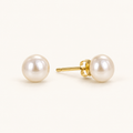 Studio visualization of white cultured pearl stud earrings with yellow-gold-finished sterling silver posts