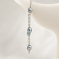 AI-enhanced silver-grey freshwater pearl station bracelet product visualization