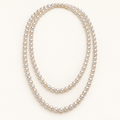 50-inch white freshwater pearl necklace styled in two loops