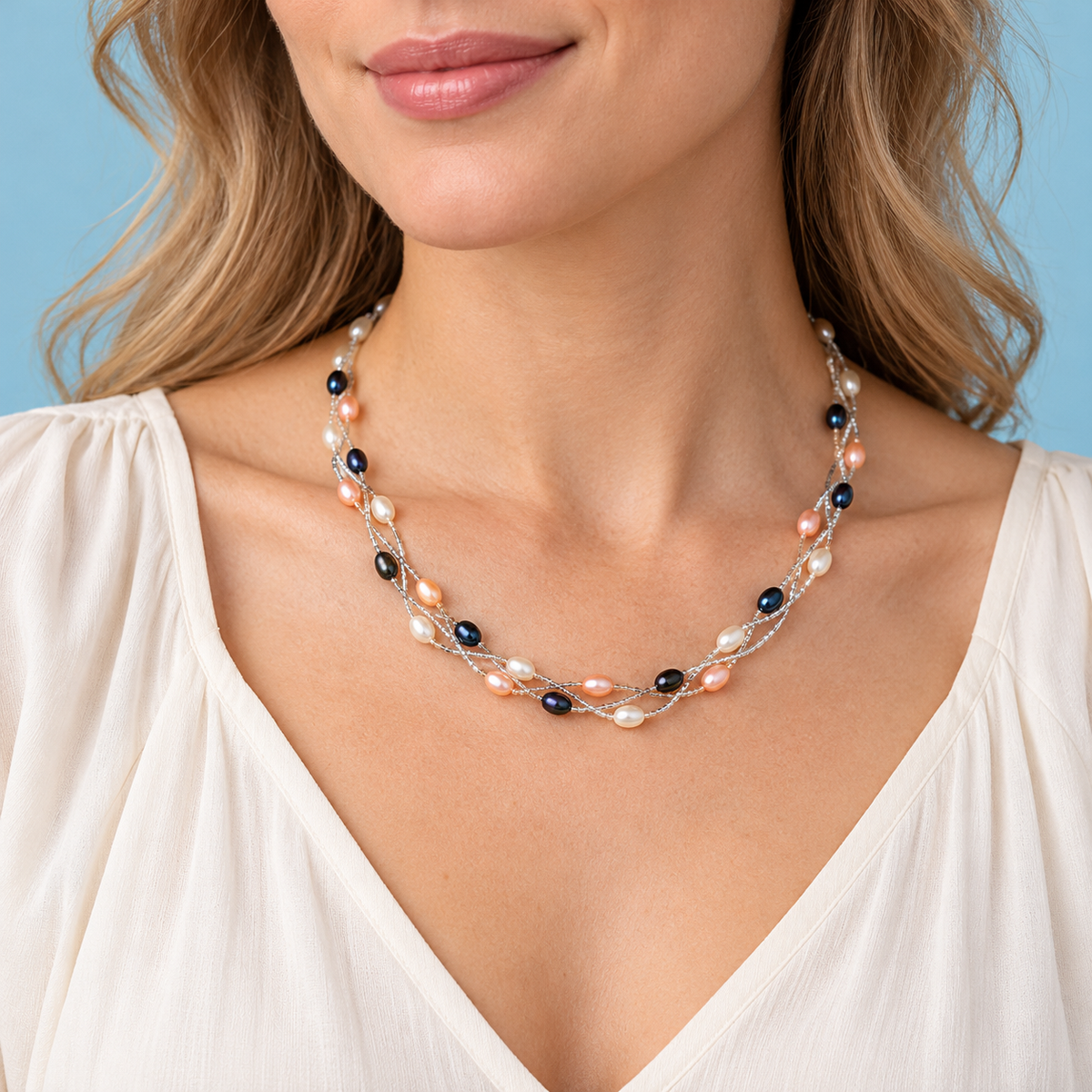 Model wearing multicolor rice pearl necklace
