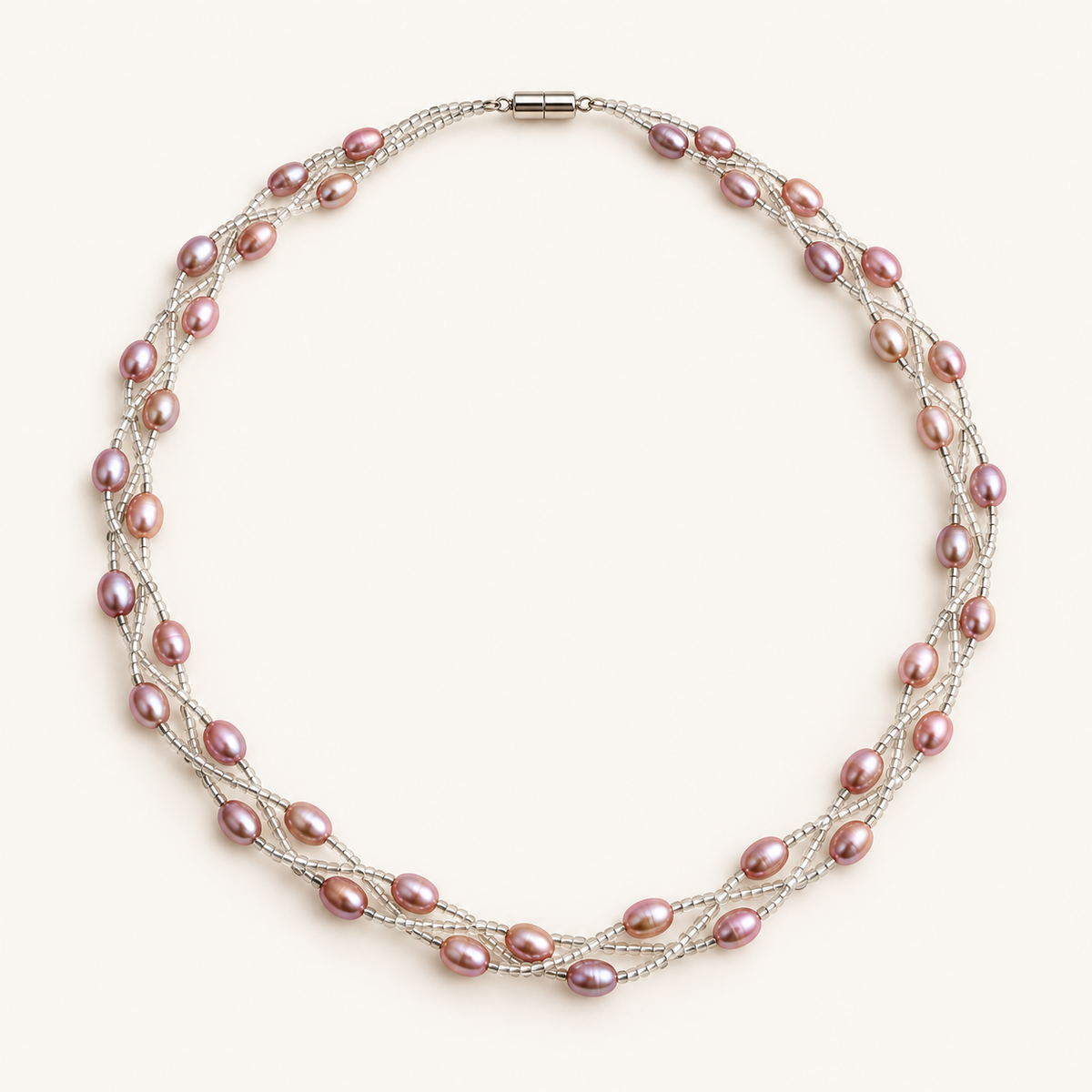 Three-strand pink rice pearl necklace with magnetic clasp