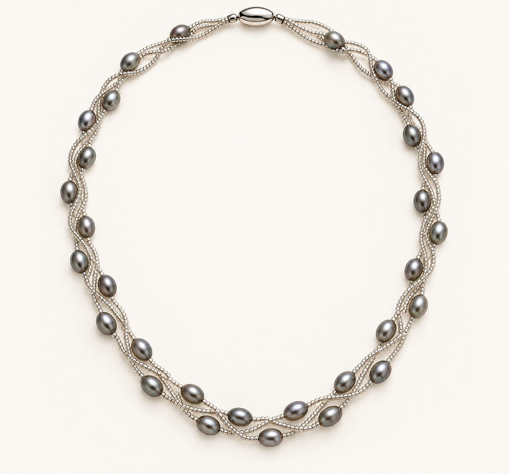 Silver-grey rice pearl twist necklace on ivory background