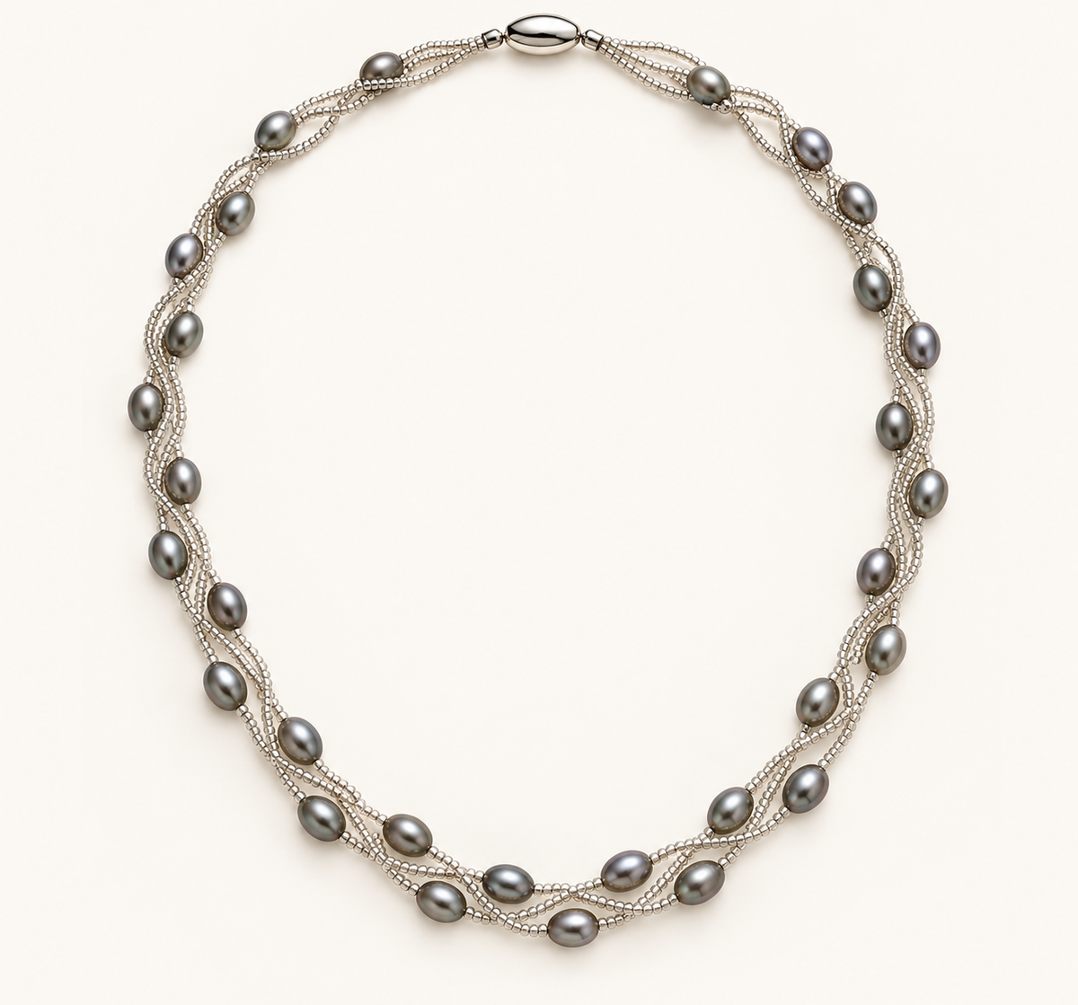 Silver-grey rice pearl twist necklace on ivory background