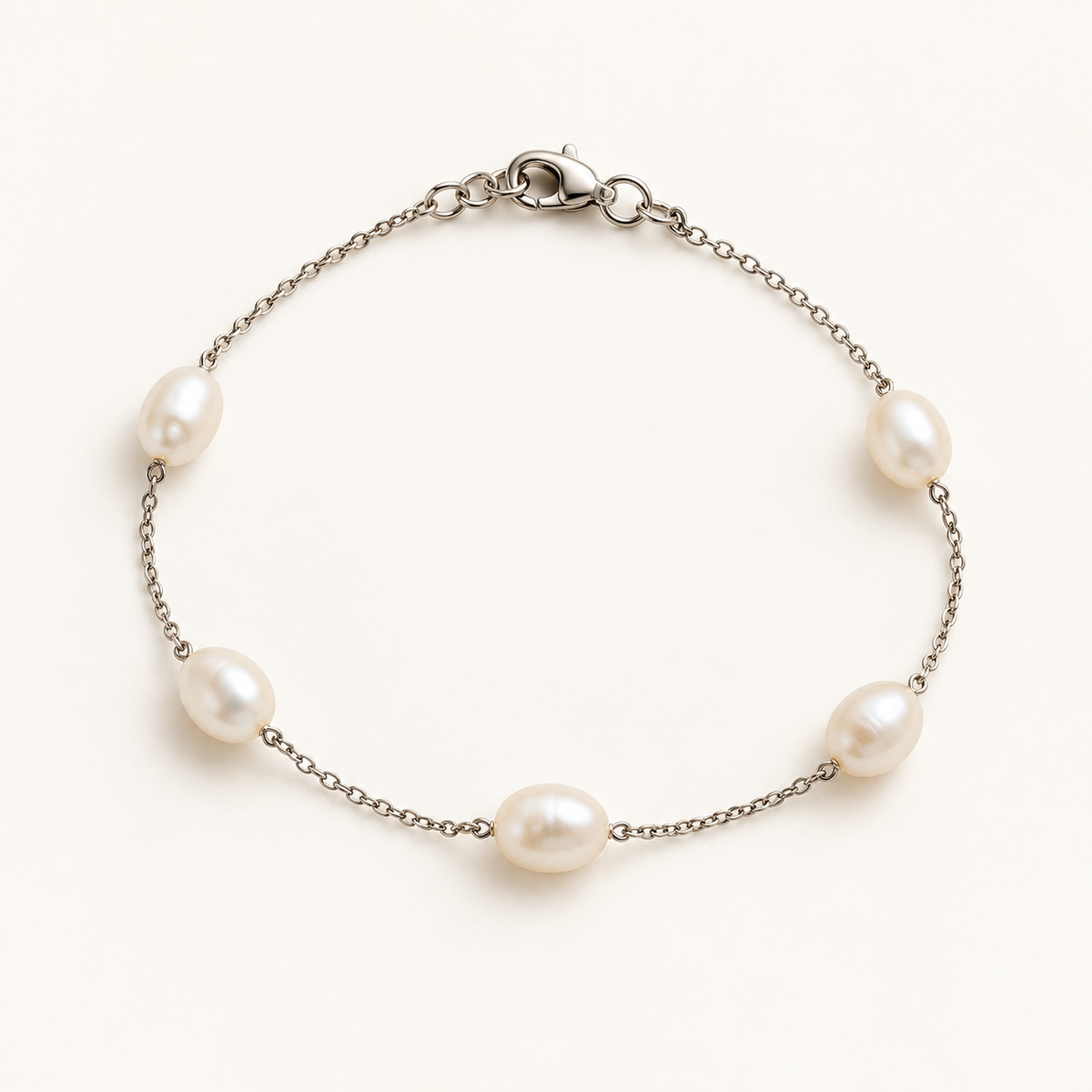 AI-enhanced white freshwater pearl station bracelet product visualization